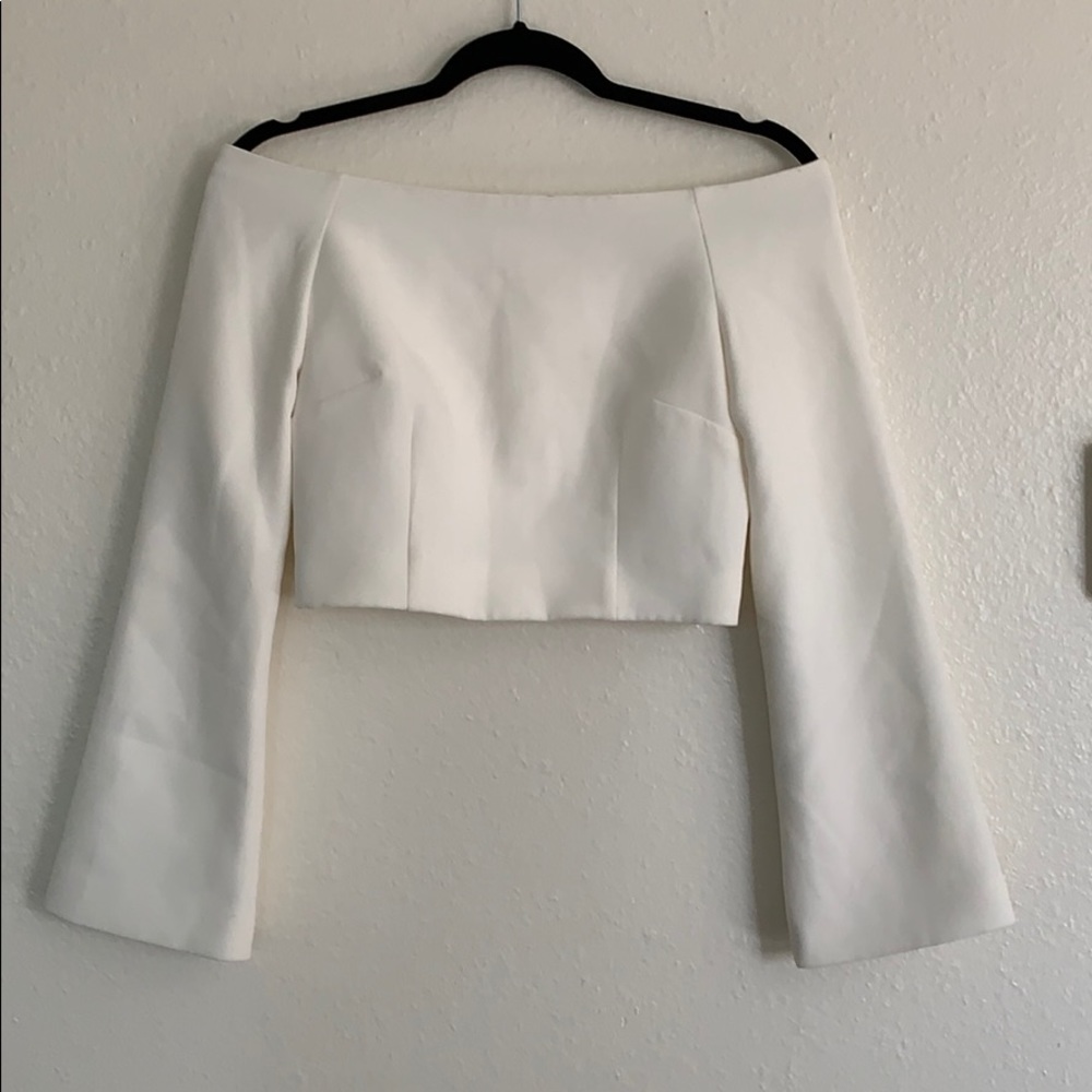 White off the shoulder mid rift top.